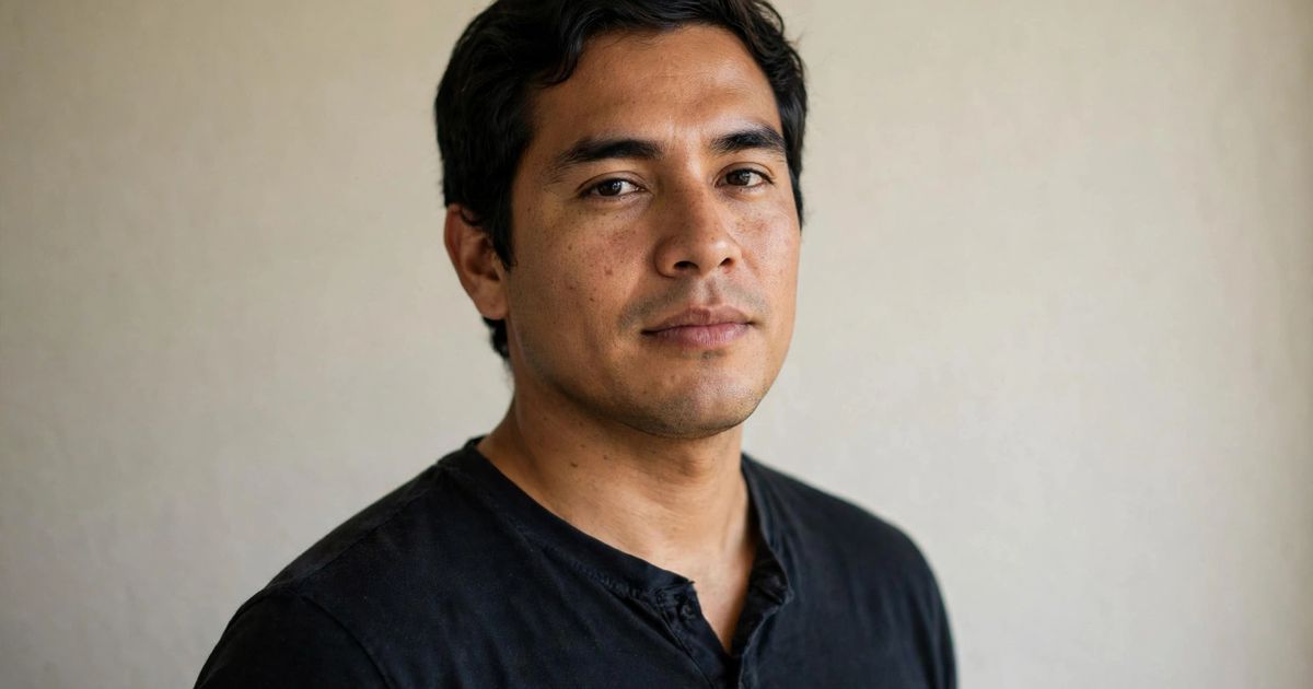 Illustration: AI-generated image of a fictional man with tall posture in a dark fitted shirt standing against a plain light background.